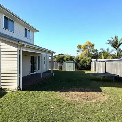 After: Salt-rotted melaleuca leaning onto a carport, Sunshine Coast